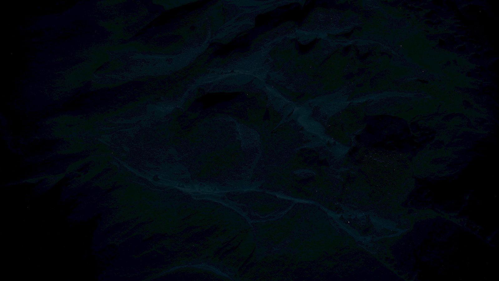 The image appears very dark, making it difficult to discern specific details clearly.